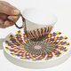Illustration for article titled Mirrored Tea Cups Perfectly Match These Patterned Saucers